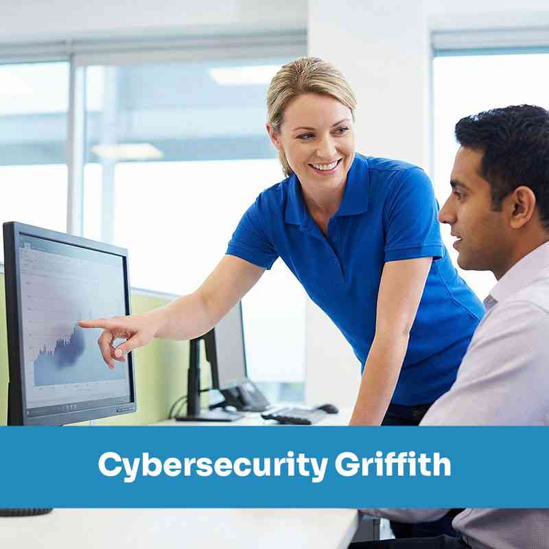 Small business team meeting with a cybersecurity company Griffith IN to strengthen cybersecurity and reduce phishing risk.